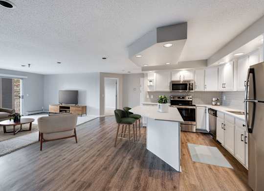 Spacious Living Area With Wood-Style Flooring