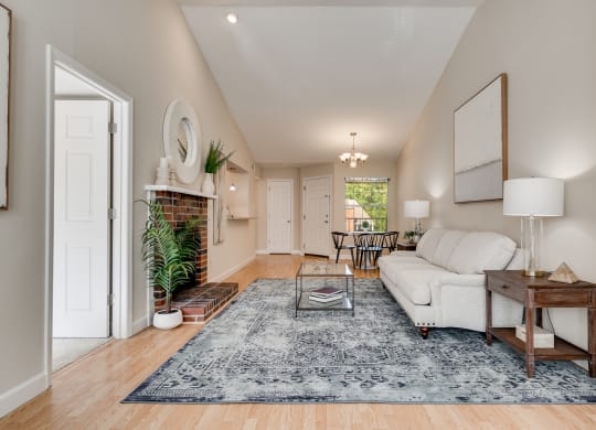 Living Room With Wood-Style Flooring & Fireplace
