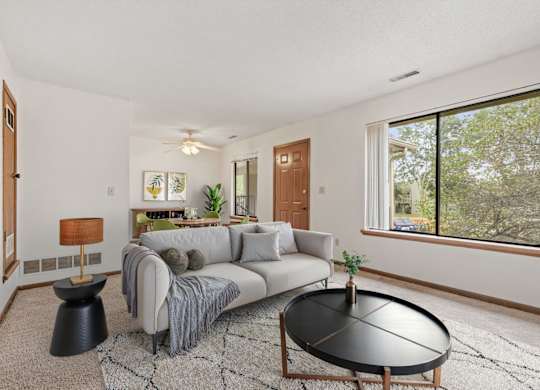 Spacious Living Area with Carpet