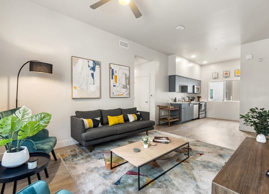 a living room with a couch and a coffee table at SECOND AVE COMMONS | BRAND-NEW, Arizona