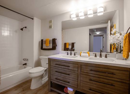Bathroom with double vanity at Los Altos Towers Apartments in Albuquerque NM