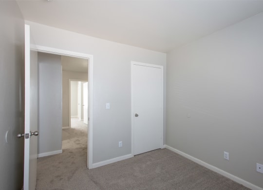 Bedroom and Hallway at The Bluffs at Tierra Contenta Apartments in Santa Fe New Mexico