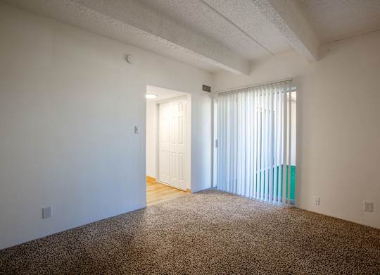 Bedroom with carpet at Los Altos Towers Apartments in Albuquerque NM