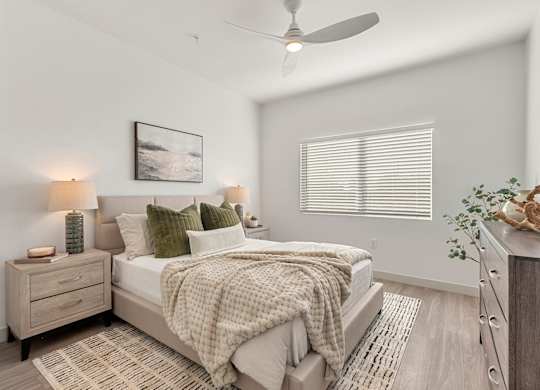 Bedroom with Ceiling Fan in Two Bedroom and Two Bath at Lucero Apartment Homes in Phoenix Arizona