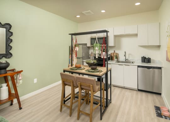 Dining Area and kitchen of One bedroom at Streamliner 16th Apartments in Phoenix Arizona