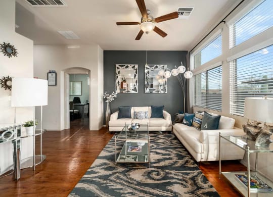 Full Living Room with Ceiling Fan at Avilla Preserve Apartment Homes in Tucson Arizona