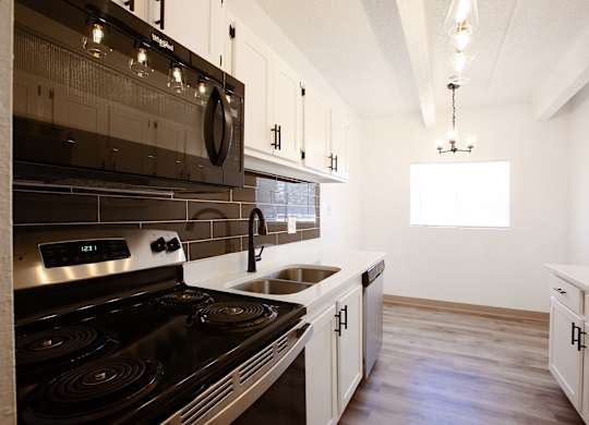 Kitchen and dingin Room at Los Altos Towers Apartments in Albuquerque NM