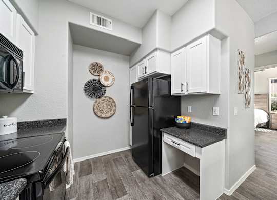 Kitchen with built in desk at Bear Canyon Apartments in Tucson Arizona