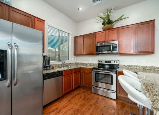 Kitchen with Stainless Steel Appliances at Avilla Preserve Apartment Homes in Tucson Arizona