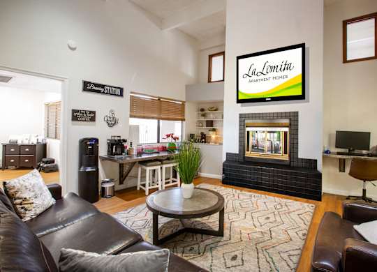 A living room with a fireplace and a sign that says
