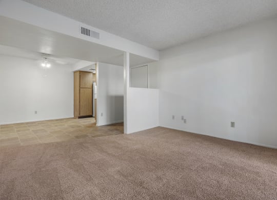 Living room and dining area at Townhomes on the Park Apartments in Phoenix AZ Nov 2020