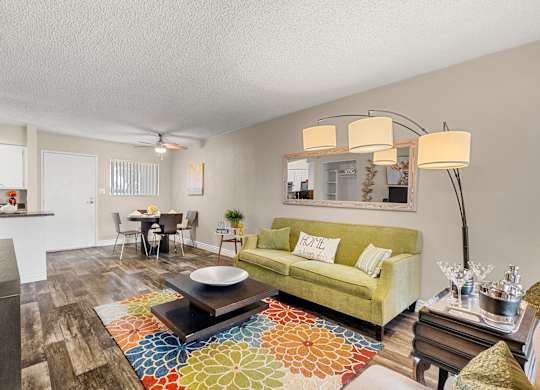 One bedroom Living room and dining area at Villa Toscana Apartments in Phoenix Arizona