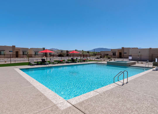 Pool with Resort Style Seating at Casitas Catalina Apartments in Tucson