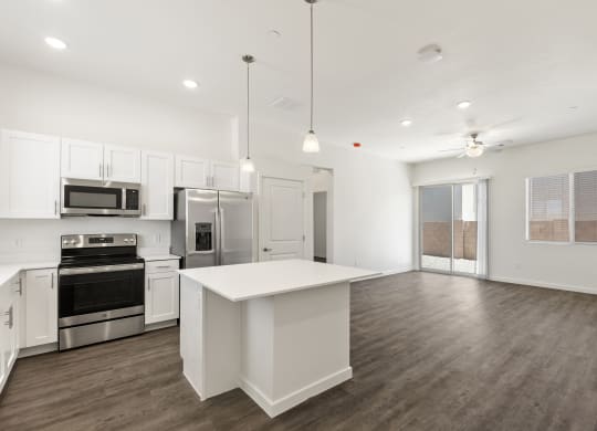 Three Bedroom Common Area at Casitas Catalina Apartments in Tucson