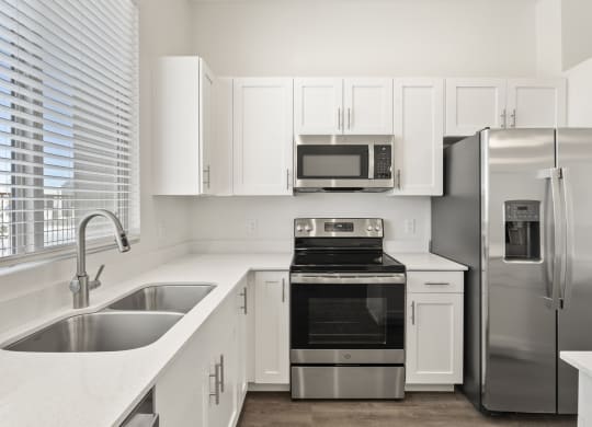 Three Bedroom Kitchen at Casitas Catalina Apartments in Tucson
