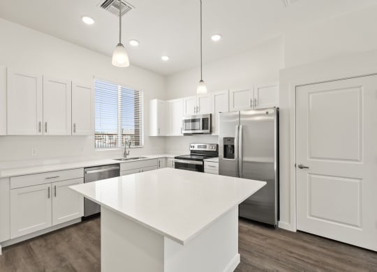 Three Bedroom Kitchen Island at Casitas Catalina Apartments in Tucson
