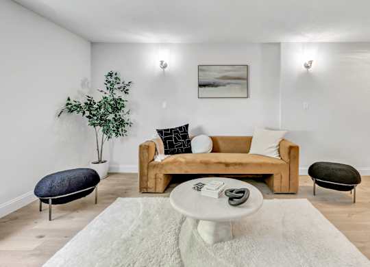 a living room with a couch and a coffee table at The Meriden, Connecticut