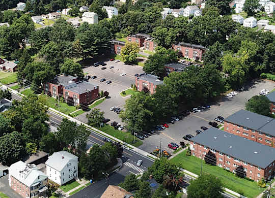 an aerial view of a parking lot in a city at Springwood Gardens, New Britain, CT, 06053