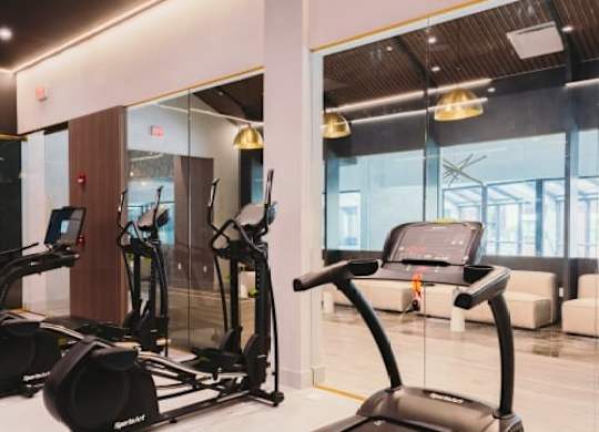 a gym with a lot of equipment in it at Up House, Connecticut, 06032