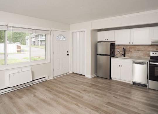 Living and kitchen at Woodbury Knoll, Woodbury, 06798