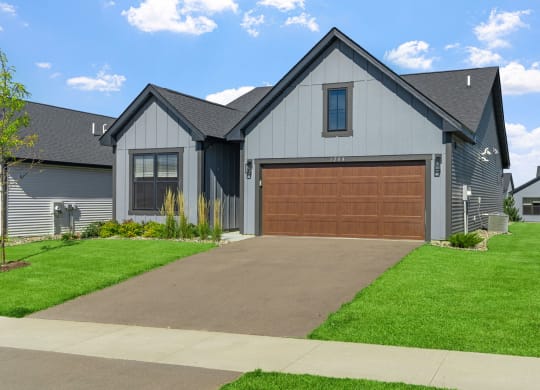 a garage door in front of a house