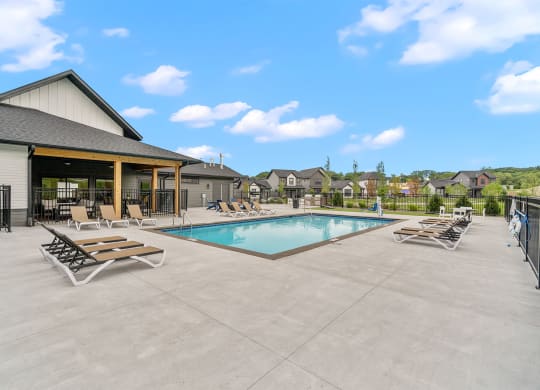 the estates at tanglewood|pool with lounge chairs and sun loungers