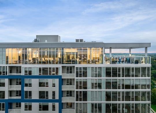a large building with people on the top of it