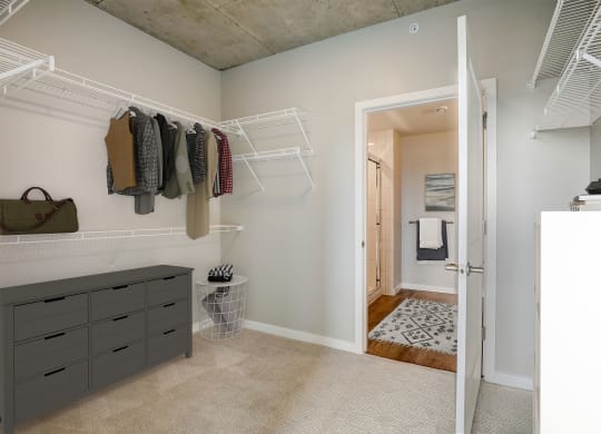 a walk in closet in a 555 waverly unit