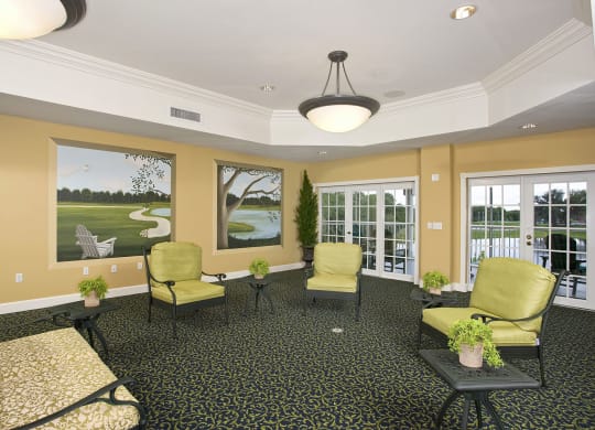 a room filled with furniture and a large windowat Arbor Oaks at Lakeland Hills, Lakeland, 33805