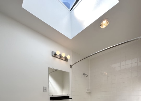 a bathroom with a toilet sink and bathtub