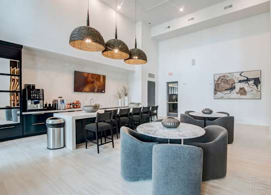 clubhouse and resident social lounge with full kitchen at Tapestry Nona Apartments in Orlando, FL