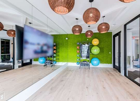 yoga room at Tapestry Nona Apartments in Orlando, FL