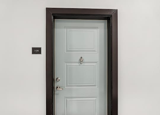Front door of an apartment at Tapestry University Park apartments in Sarasota, FL