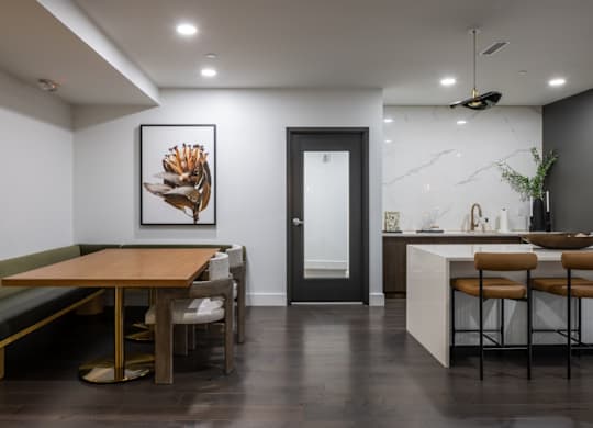 Modern clubhouse kitchen and lounge at 2020 Providence in Huntsville, AL