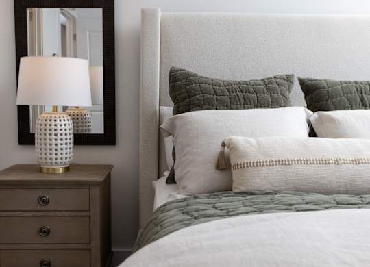 A bedroom with oversized furniture at 2020 Providence in Huntsville, AL