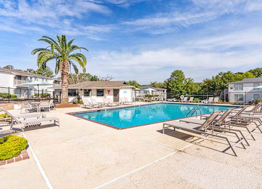 sparkling pool and sundeck at 701 South Apartments in Mobile, AL