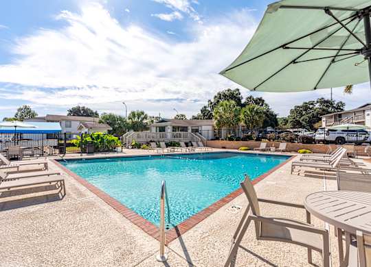 sparkling pool and sundeck at 701 South Apartments in Mobile, AL