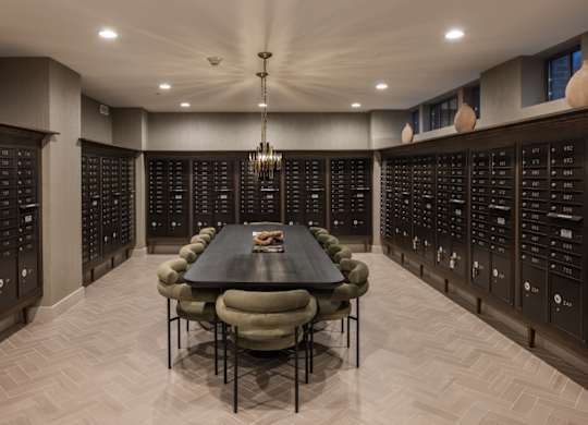 Package room with large conference table at 2020 Providence in Huntsville, AL