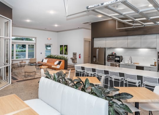indoor/outdoor social club and bar with kitchen at Anthem Apartments and Cottages in Huntsville, Alabama