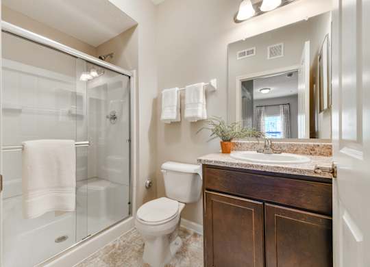 Modern Bathrooms with Showers at Austin Place Apartments