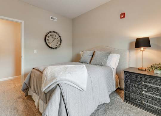Furnished Carpeted Bedroom At Austin Place Apartments