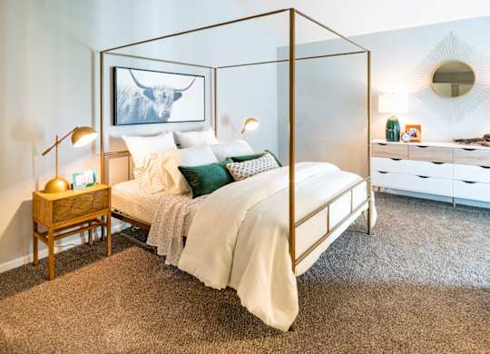 bedroom with natural light and plush carpet at Saddlebrook at Tates Creek Apartments in Lexington, KY