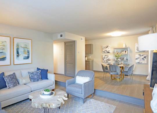 Open floor plan with living room and dining area at Avia Apartments in Vestavia Hills, AL