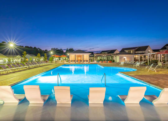 resort-style swimming pool with sun shelf at Anthem Apartments and Cottages in Huntsville, Alabama