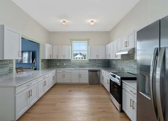 Clubhouse Kitchen at Cottages at Foley Farms Apartments in Foley, AL