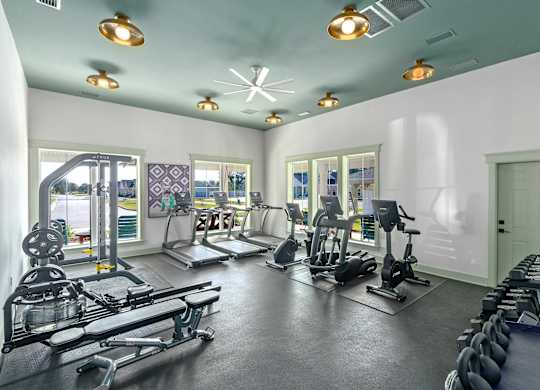 24-hr Fitness Center at Cottages at Foley Farms Apartments in Foley, AL