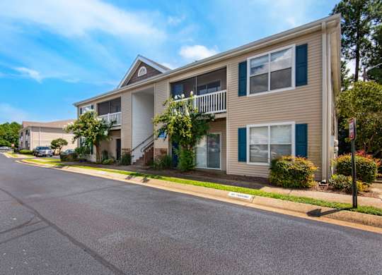 A street view of a two-story apartment building at Crystal Lake in Pensacola, Florida.