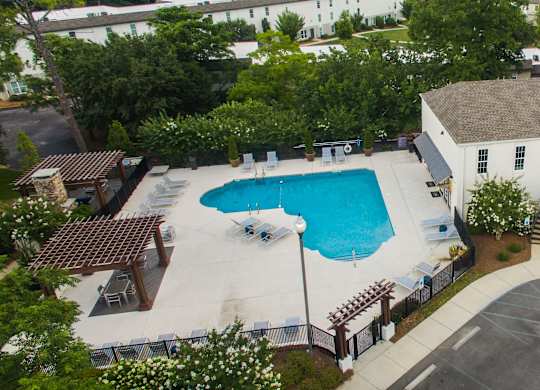 an aerial view of a swimming pool at Avia Apartments in Vestavia Hills, AL