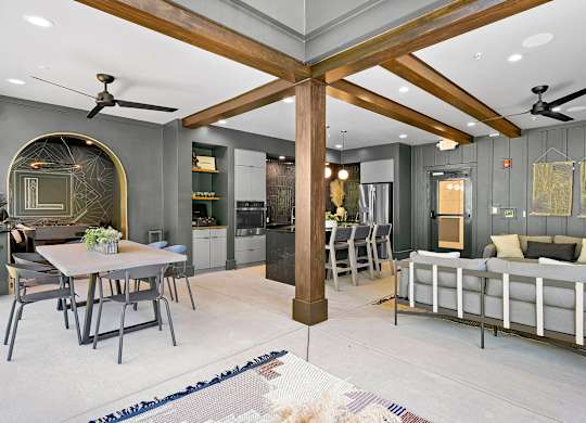 A modern living room with a dining table and a sofa.