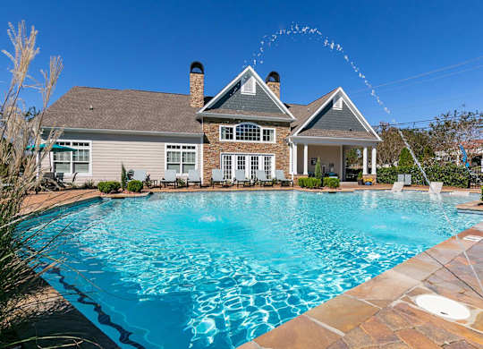 Resort-style pool with sundeck at Magnolia Preserve in Dothan, AL